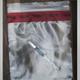 Illustration for article titled Check Out These Eerie New emGone Girl/em Evidence Bag Posters